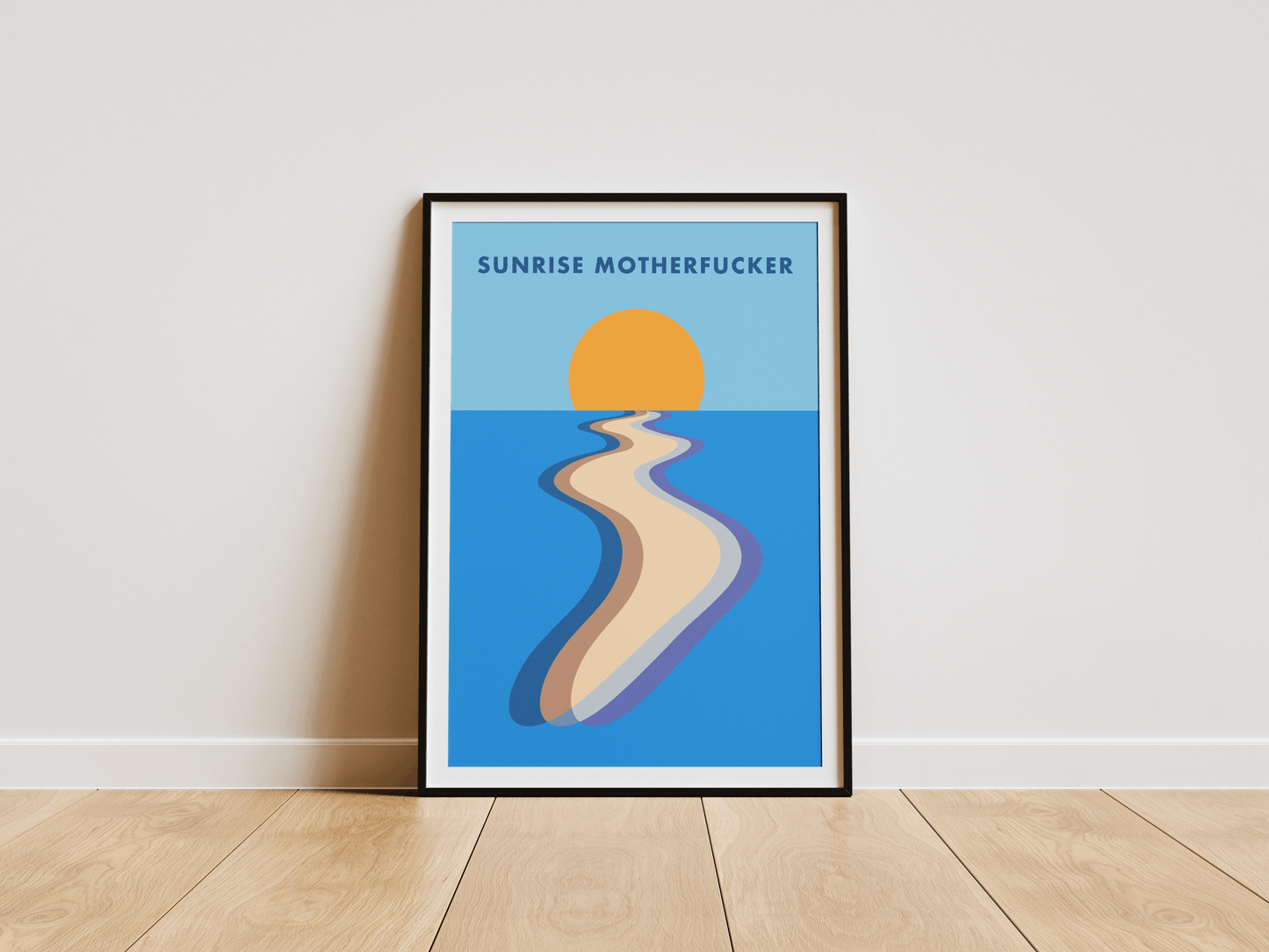 Framed artwork with a stylized beach scene and text on a white wall.