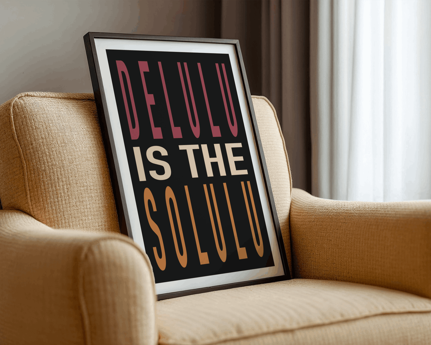 Framed poster with 'DELULU IS THE SOLULU' text on a beige armchair.