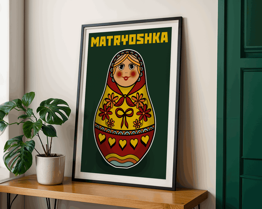 Framed Matryoshka doll artwork on a wooden shelf with a plant.
