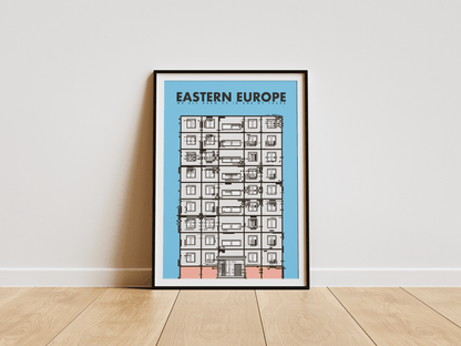Framed poster with 'Eastern Europe' text and building illustration on a light gray wall.