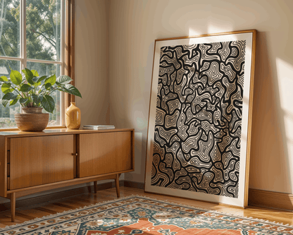 Room interior with a wooden sideboard, plant, and abstract art on the wall.