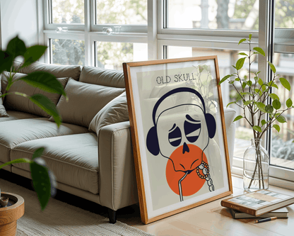 Framed artwork titled 'Old Skull' in a living room setting with a couch and plants.