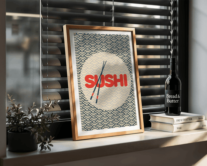 Framed poster with 'SUSHI' text on a shelf with books and a bottle.