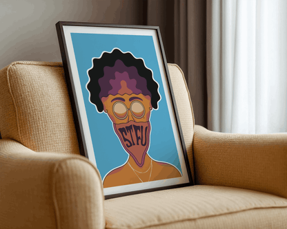 Framed artwork of a stylized face with the text STFU on a beige sofa