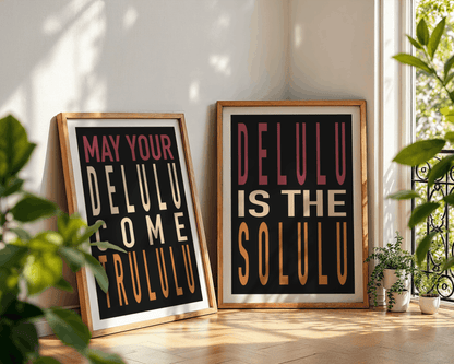 Two framed posters with delulu text on a wooden floor with plants around