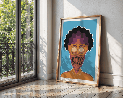 Framed artwork of a person with text on a blue background, leaning against a wall near a window.