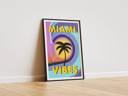 Framed 'Miami Vibes' poster with palm tree design on a white wall.