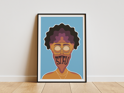 Framed artwork of a stylized face with text on a blue background, leaning against a white wall.