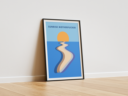 Framed artwork with a stylized depiction of a sunrise over water on a white wall.
