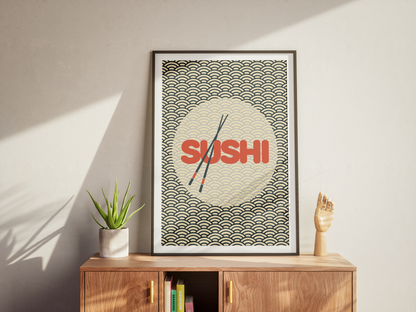 Framed artwork with 'SUSHI' text on a wall above a wooden cabinet.